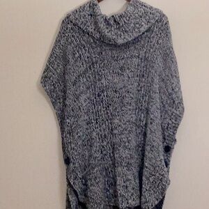 Cow neck black and grey poncho sweater.